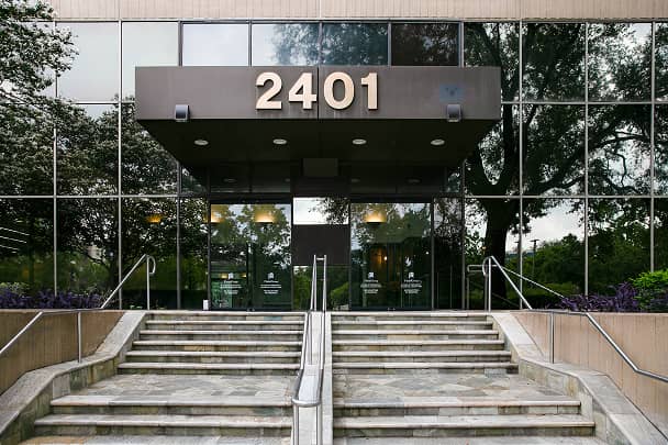 Smiles Art Dentistry
| Entrance of a commercial building with address number 2401 and glass windows.